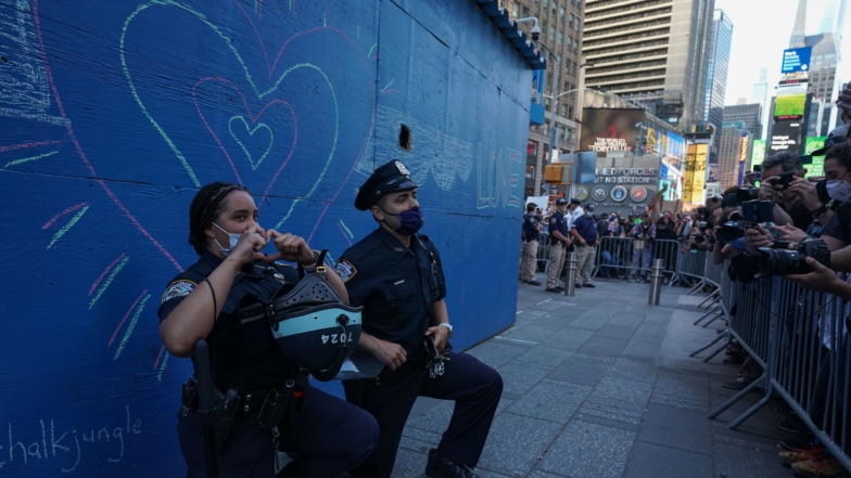 Police and Protesters Kneel Together And Hug Amid George Floyd Protests