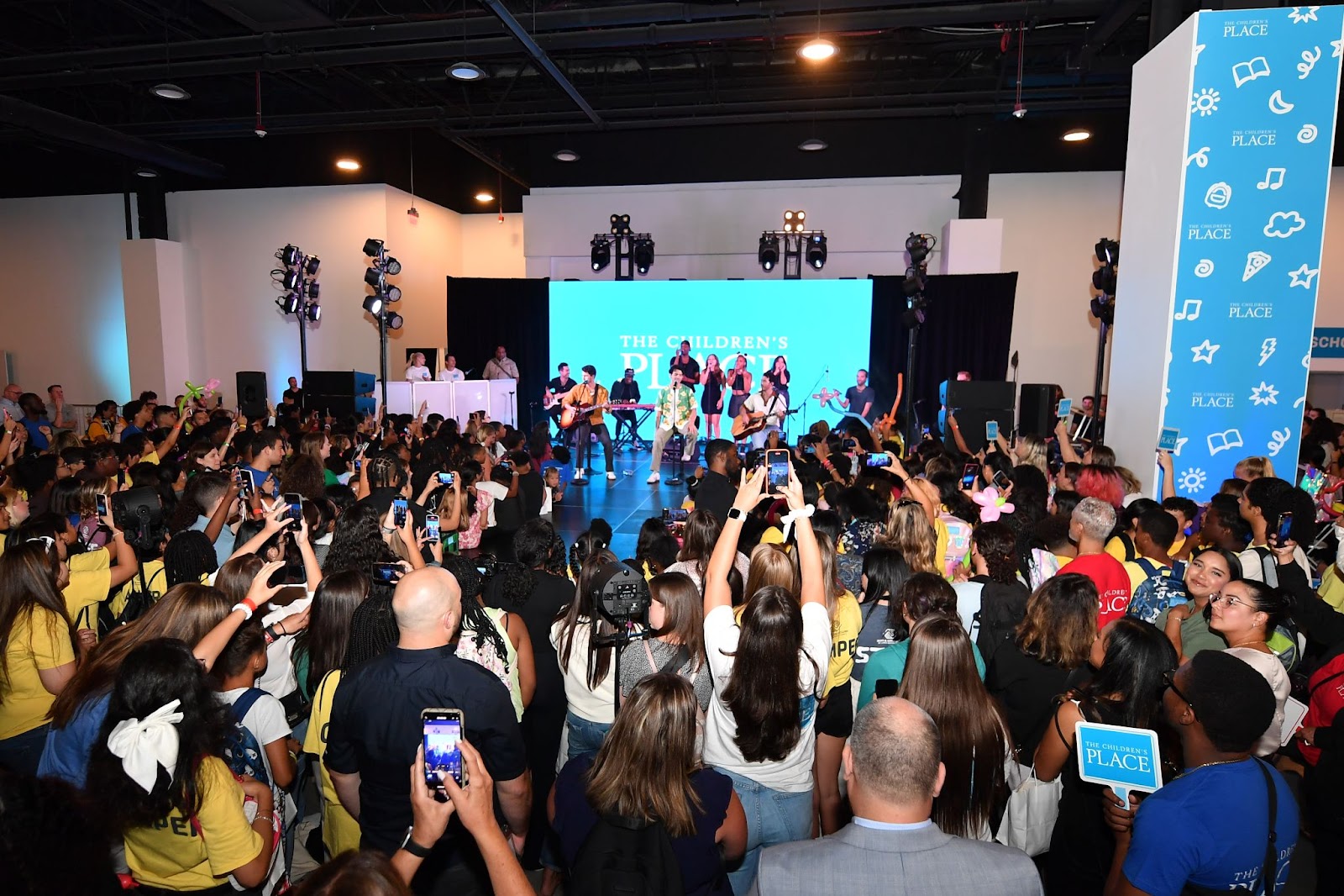 Hundreds of back-to-schoolers from the local Boys + Girls Club of America chapter watch the Jonas Brothers perform at The Children’s Place Best School Day Ever Event in East Rutherford, NJ on August 10th, 2023.