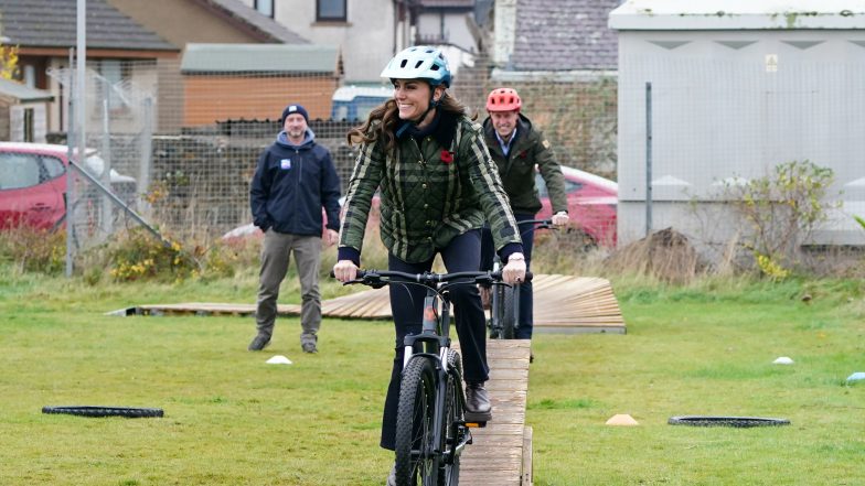 Kate Middleton & Prince William Show Off Their Bike Riding Skills In Sporty Charity Outing